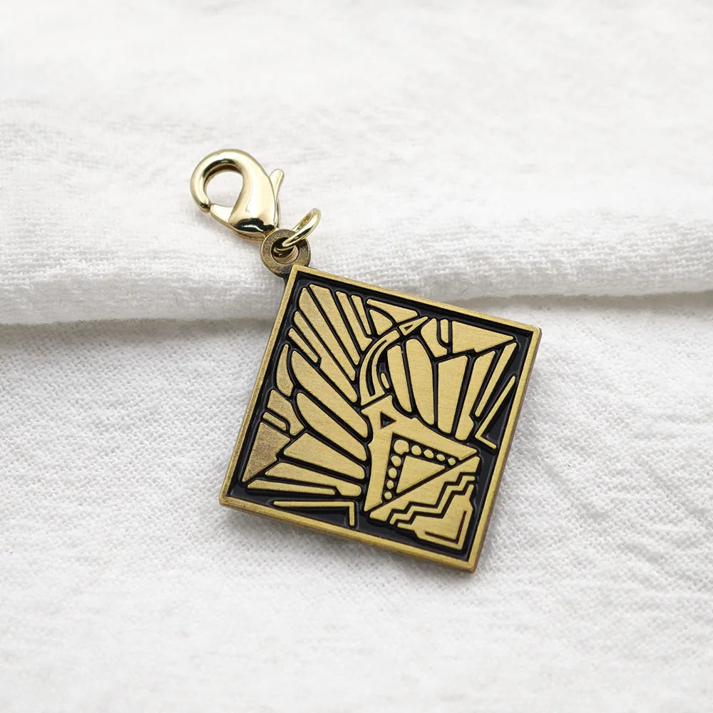 Expedition 33 Double-Sided Metal Keychain