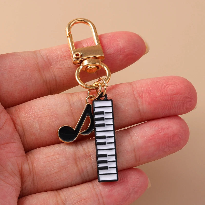 Piano and Music Note Keychain in Gold Tone