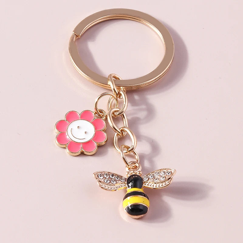 Bee and Honeycomb Charm Keychain in Rose Gold Tone