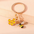 Bee and Honeycomb Keychain in Rose Gold Tone
