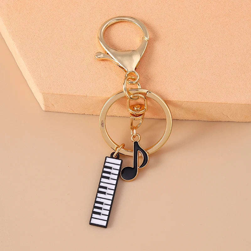 Piano and Music Note Keychain in Gold Tone