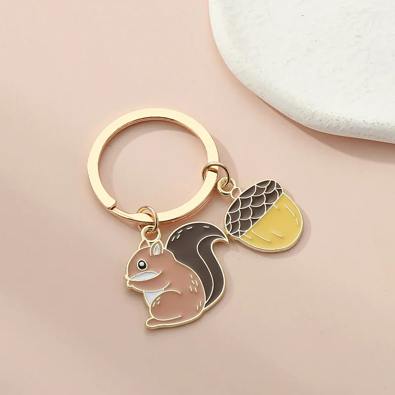 Squirrel and Pine Cone Metal Keychain