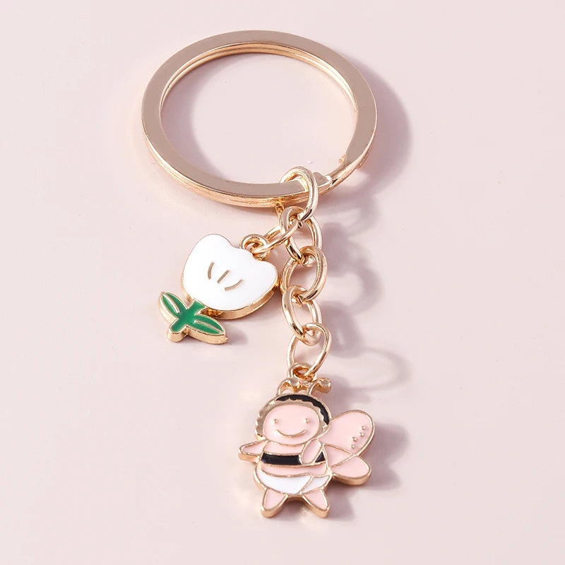 Bee and Honeycomb Keychain in Rose Gold Tone