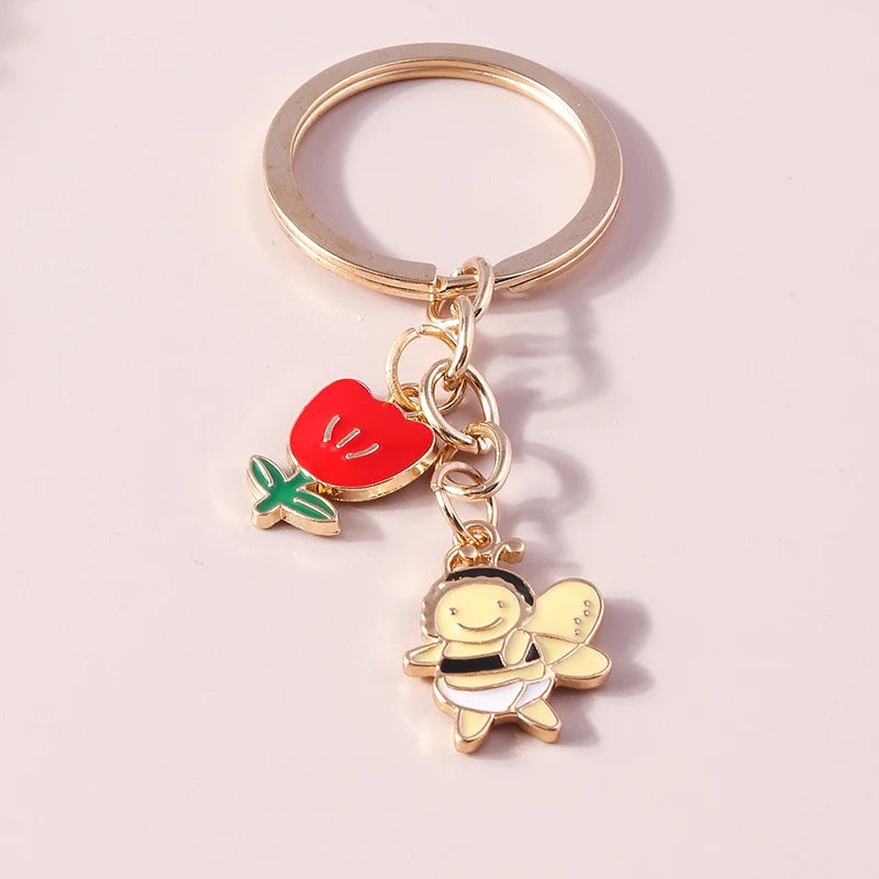 Bee and Honeycomb Charm Keychain in Rose Gold Tone