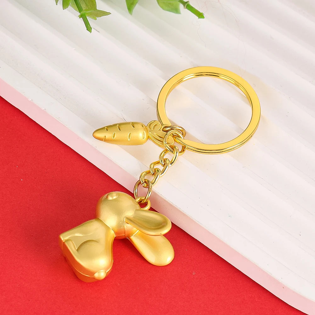 Rabbit and Carrot Metal Keychain in Satin Gold