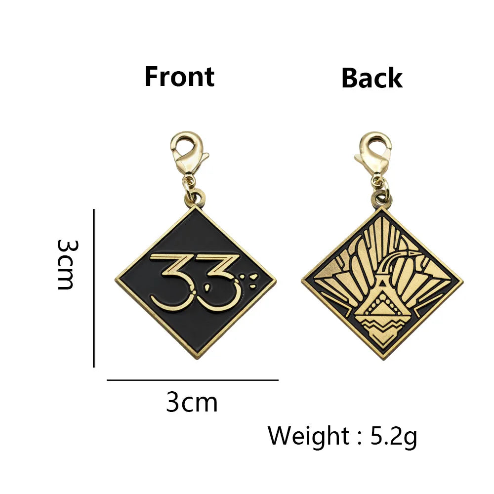 Expedition 33 Double-Sided Metal Keychain