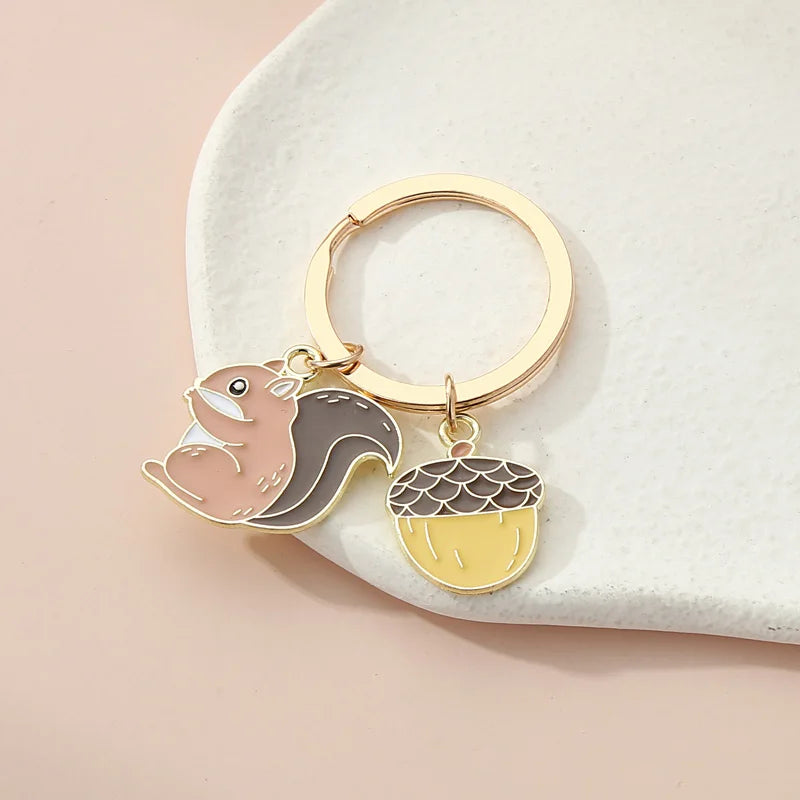 Squirrel and Pine Cone Metal Keychain
