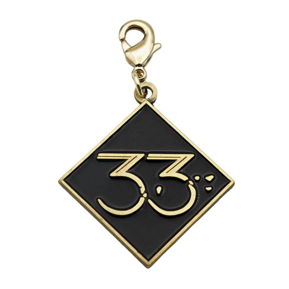 Expedition 33 Double-Sided Metal Keychain
