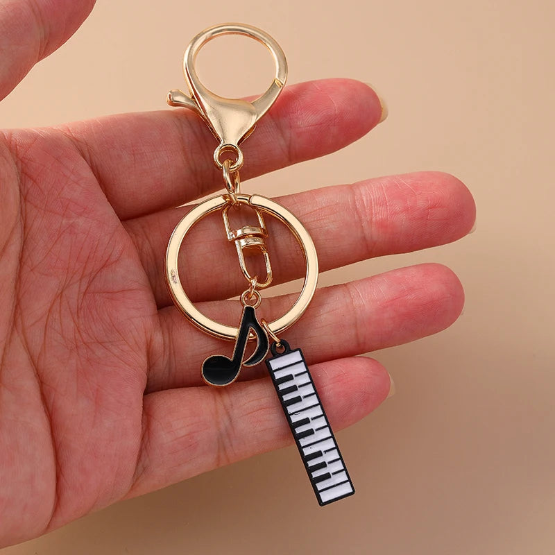 Piano and Music Note Keychain in Gold Tone