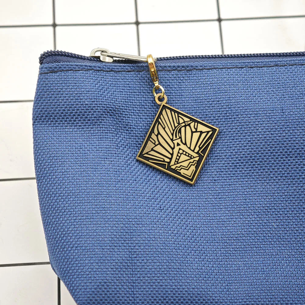 Expedition 33 Double-Sided Metal Keychain