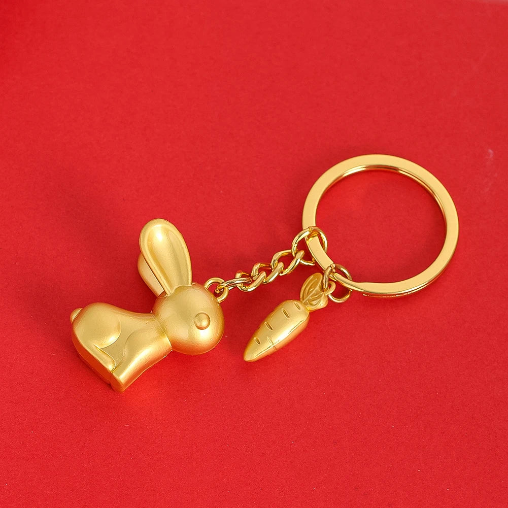 Rabbit and Carrot Metal Keychain in Satin Gold