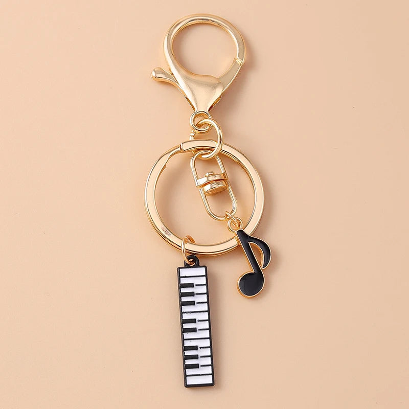Piano and Music Note Keychain in Gold Tone