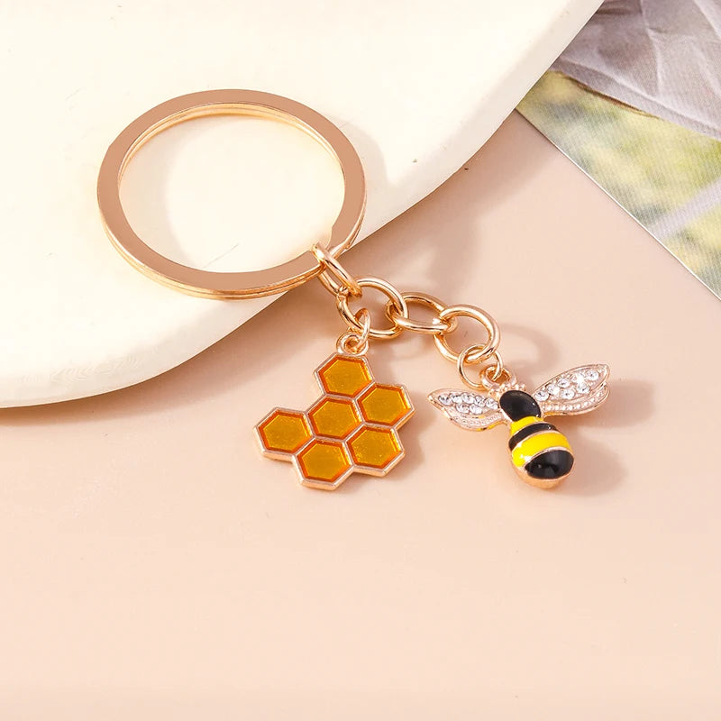 Bee and Honeycomb Charm Keychain in Rose Gold Tone