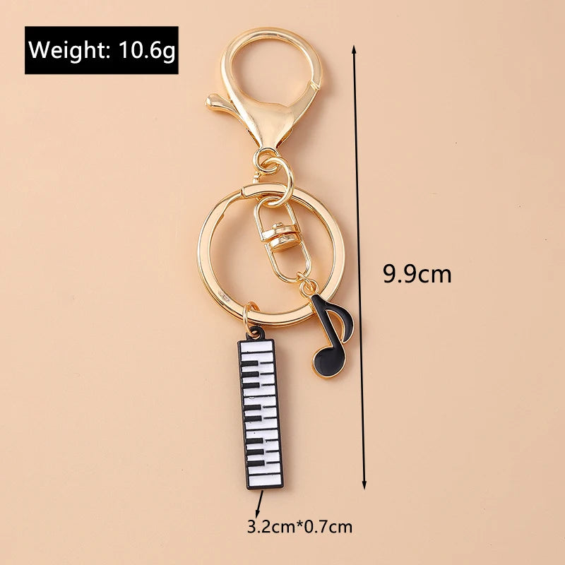 Piano and Music Note Keychain in Gold Tone